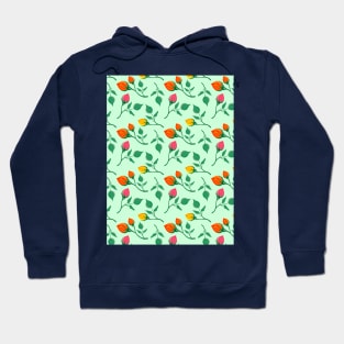 Floral pattern with yellow red and pink rose flowers on green backdrop Hoodie